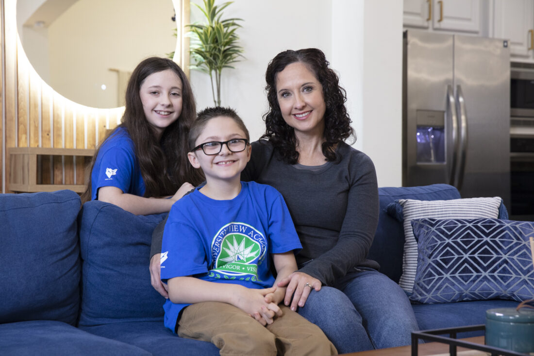 Two children and their mother.