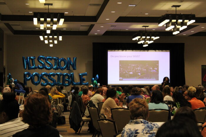 Dr. Timoll presenting to the convocation audience