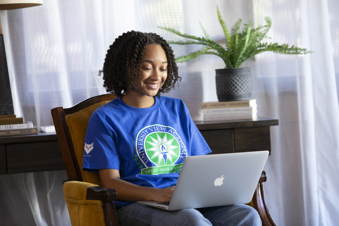 High School girl learns online at UVA.