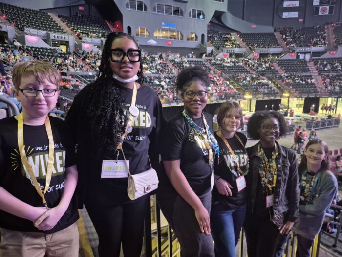 Members of Junior Beta Club smile and pose for a picture