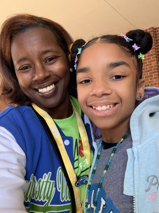 Elementary principal Kaleisha London with a student