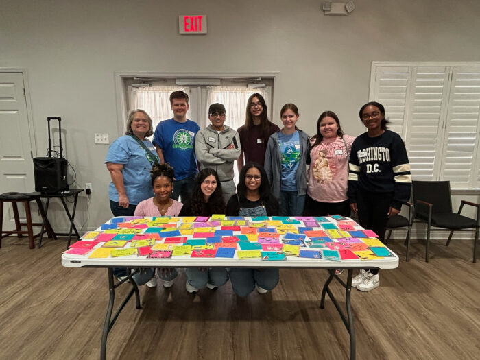 NHS students with their cards to donate